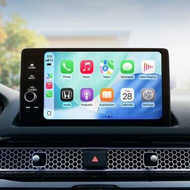 2026 Honda Civic Hatchback Sport Touring Hybrid dashboard with screen displaying Apple CarPlay (Compact Hatchback).